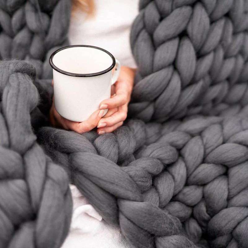 dark gray chunky knitted wool blanket 800x800